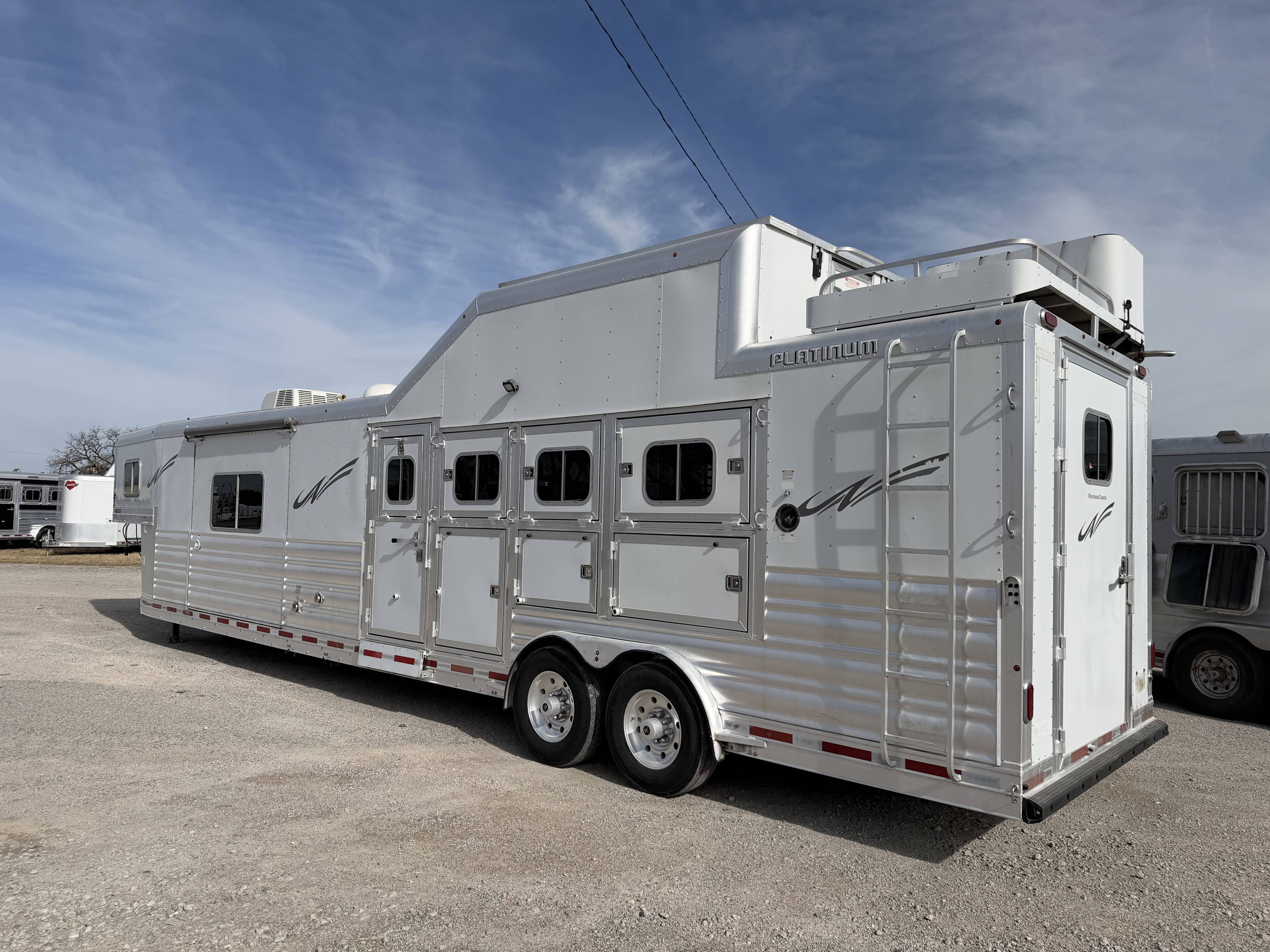 2015 Platinum Coach 4H 15'6 SW Slide Out Side Load Living Quarter Trailers