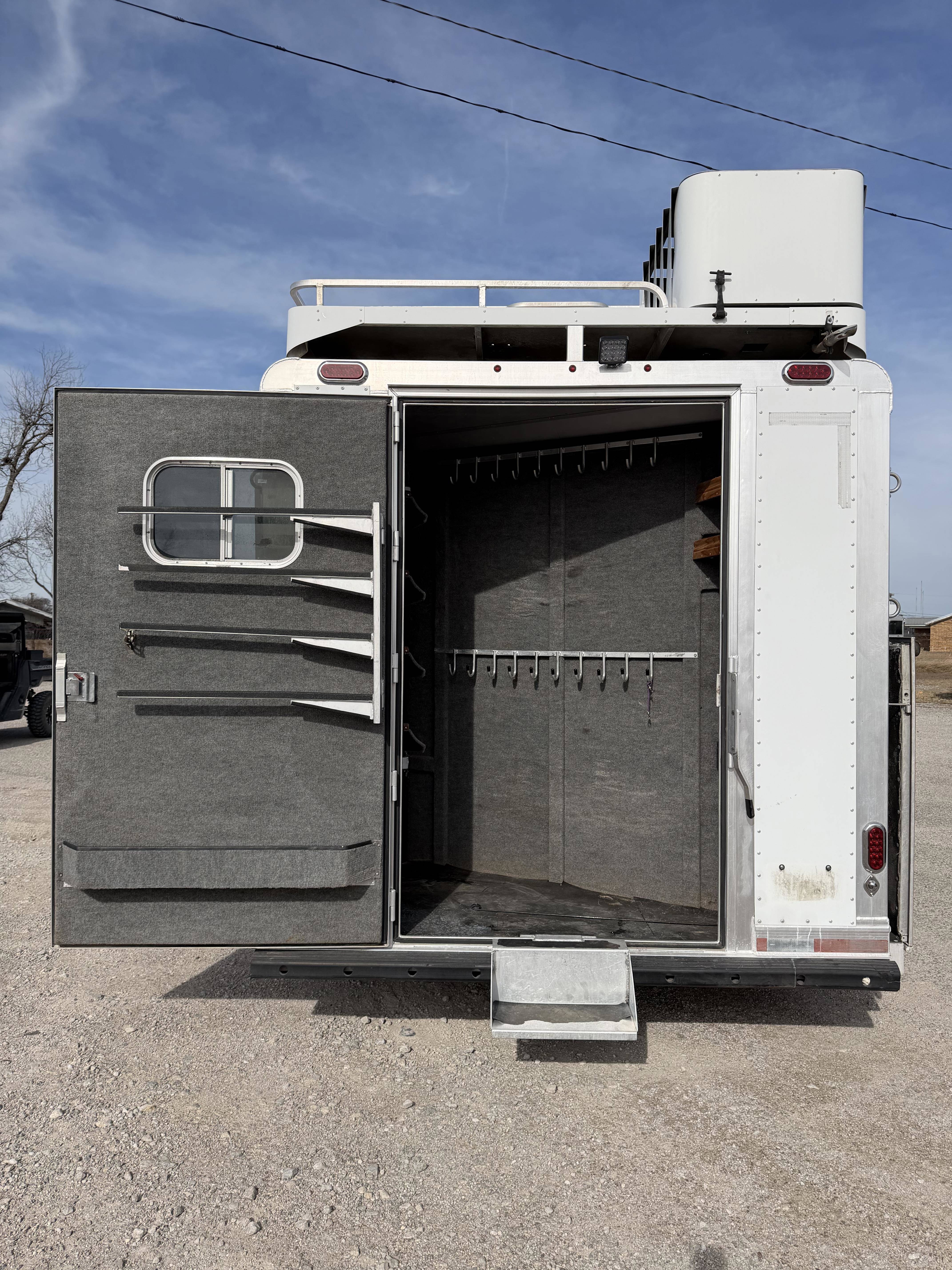 2015 Platinum Coach 4H 15'6 SW Slide Out Side Load Living Quarter Trailers